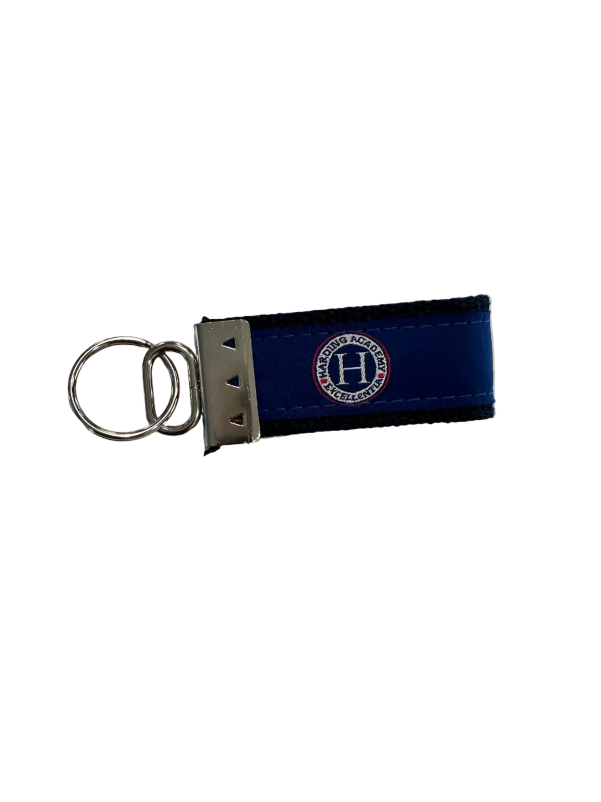Blue keychain with a logo on a light gray surface